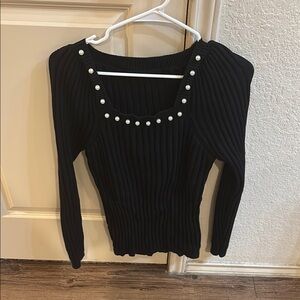 Black Ribbed Sweater with Pearl Accent